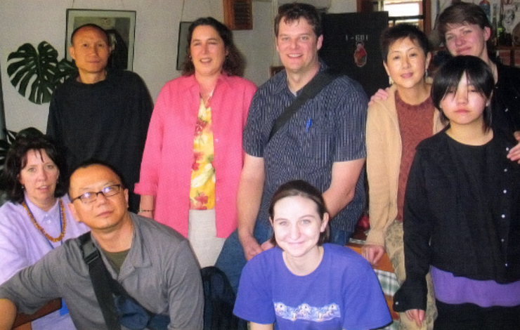 At the home of filmmaker Liu Xiaojin in Kumming. Back row, left to right: Liu Xiaolin's husband, Mao Xuhei; Mimi Pickering; Greg Howard; Liu Xiaojin and her daughter, Momo; Maureen Mullinax, Front row, left to right: Elizabeth Barret; Somi Roy; Barret's daughter, Ada. Photo courtesy of L. Somi Roy.