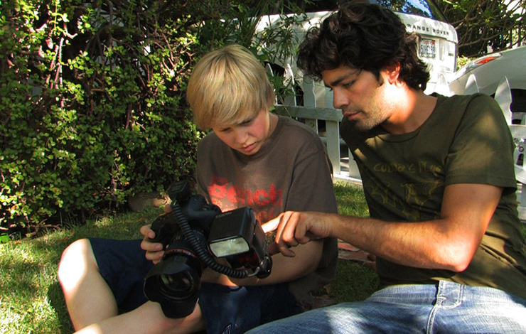 Adrian Grenier (right) and Austin Visschedyk, subject of Grenier's <em>Teenage Paparazzo</em>. Courtesy of HBO