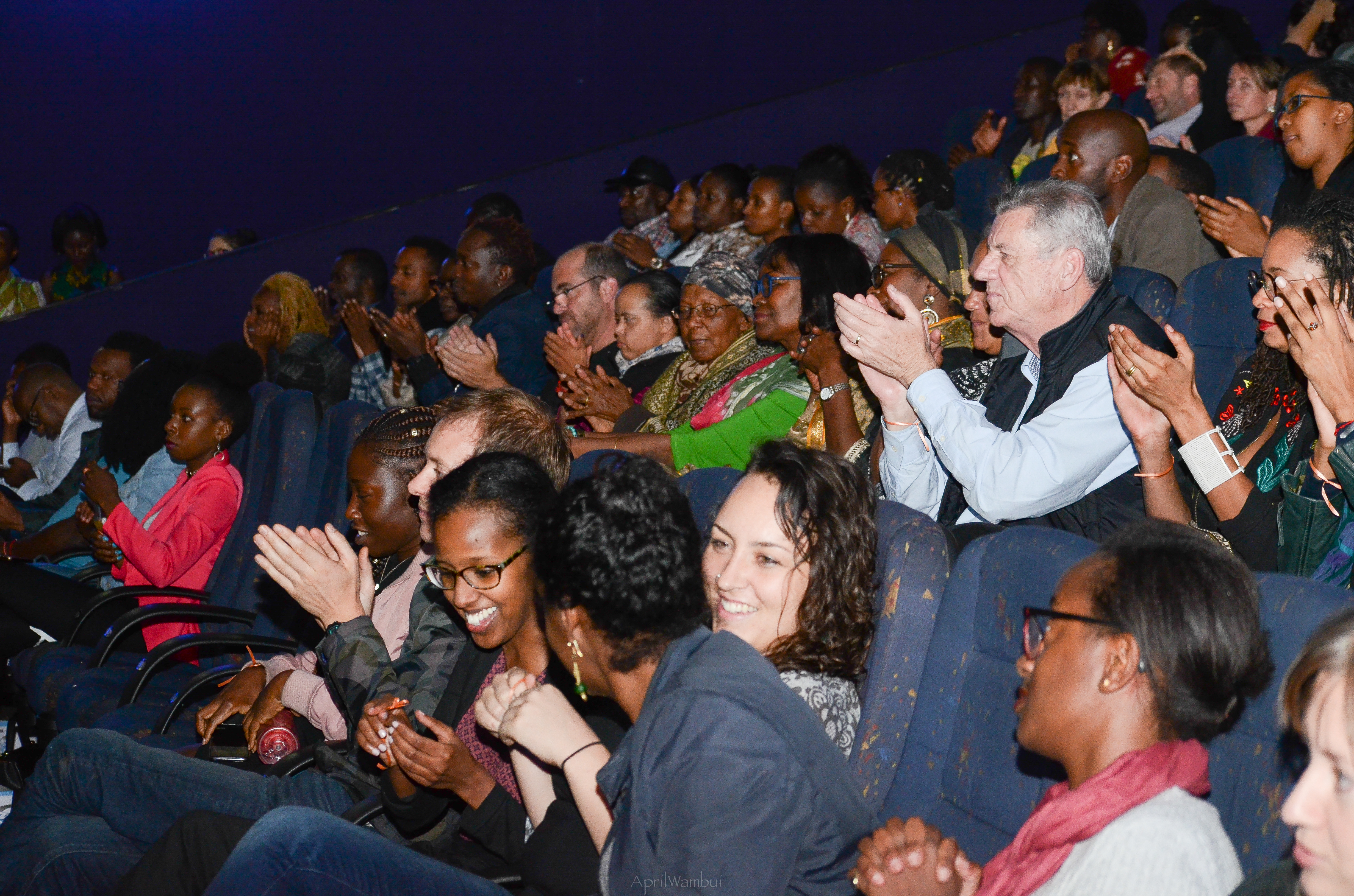 Audience members applaud at the Kenyan premiere of Philippa Ndisi-Herrmann’s 'New Moon.' Photo courtesy of Docubox. 