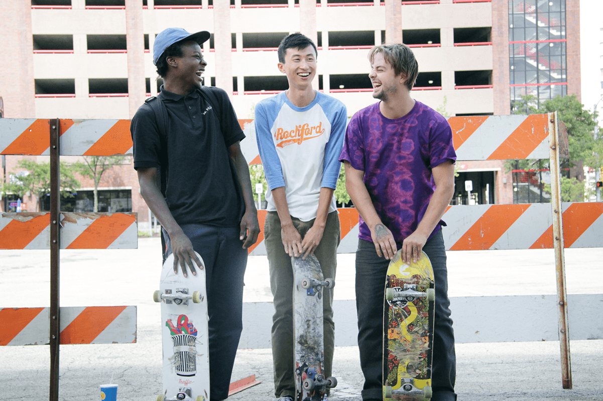 Bing Liu (center), flanked by his protagonists from Minding the Gap, Kiere and Zack.