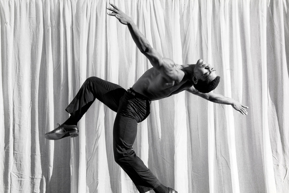 Alvin Ailey is a legendary Black male dancer, photographed on stage, in a ballet pose. From Jamila Wignot’s ‘Ailey.’ Courtesy of Jacob's Pillow / Licensed from Harvard (John Lindquist rights)