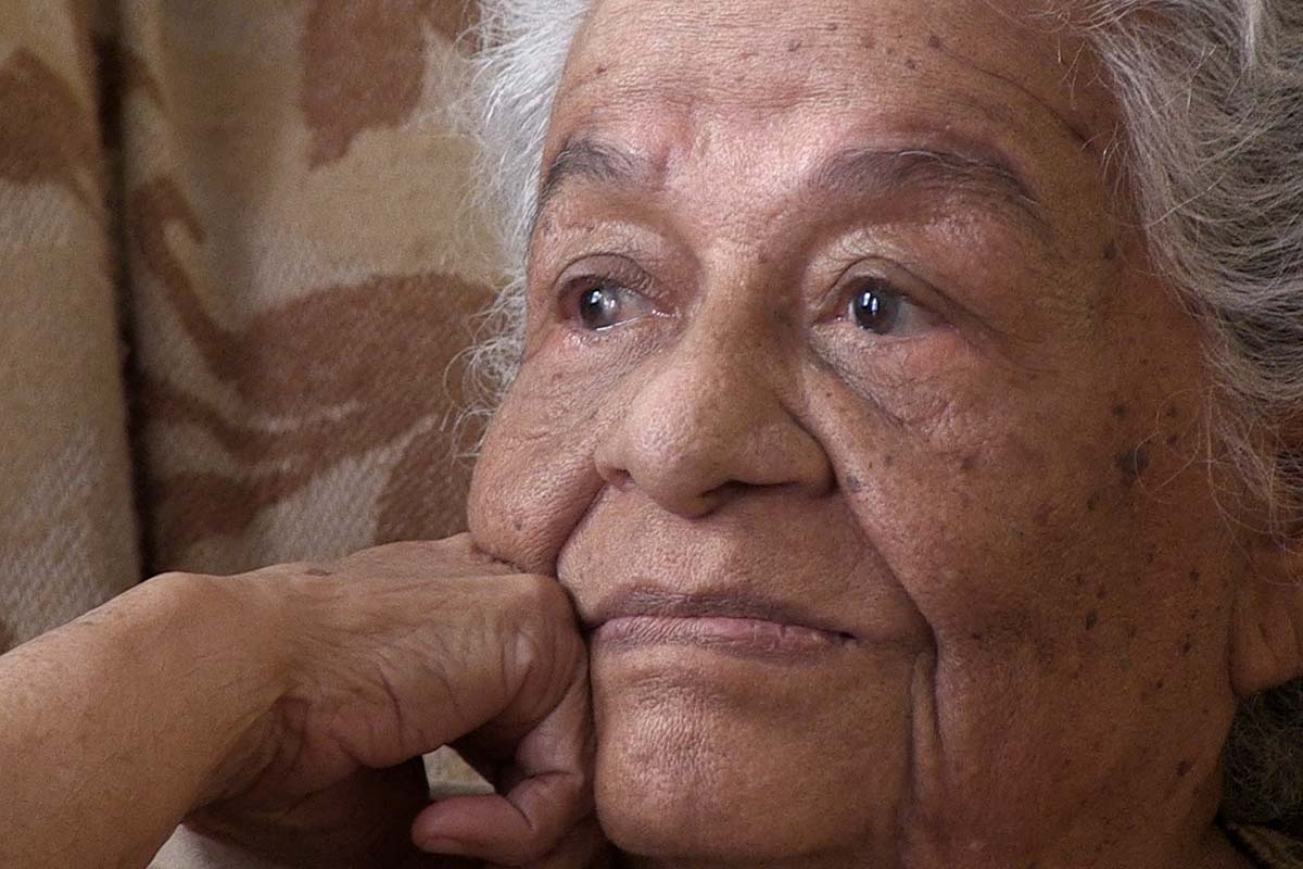 Mama Icha is a senior Colombian woman seen here wistfully lost in thought. From Óscar Molina’s ‘La Casa de Mama Icha.’ Courtesy of Óscar Molina.