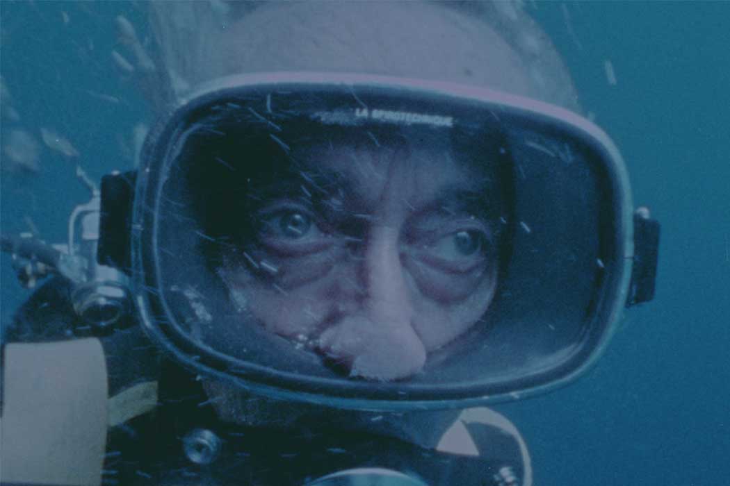 Film still of Jacques Costeau underwater in scuba diving gear. Courtesy of The Cousteau Society/National Geographic