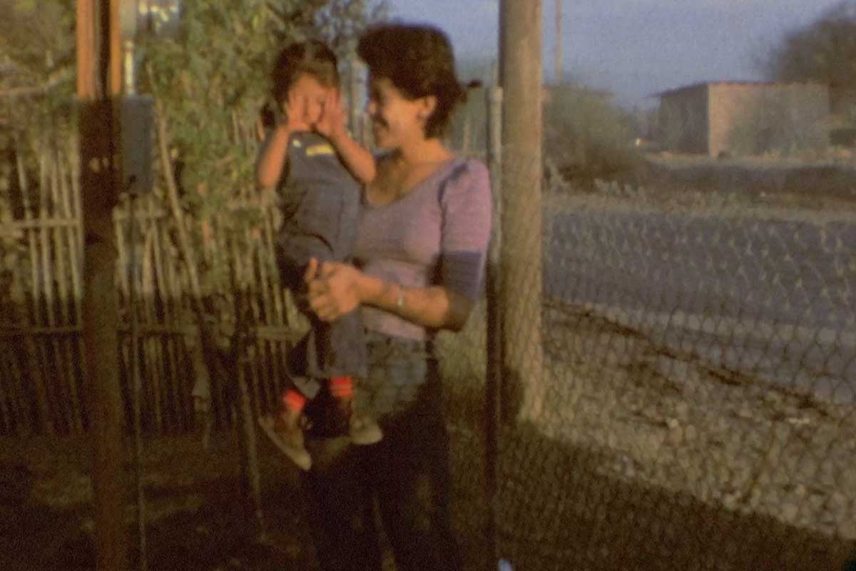Still from Super 8mm video footage of a young Jasmin Mara López held by her mother, Sandra. From Jasmin Mara López’s ‘Silent Beauty.’ Courtesy of Hot Docs.
