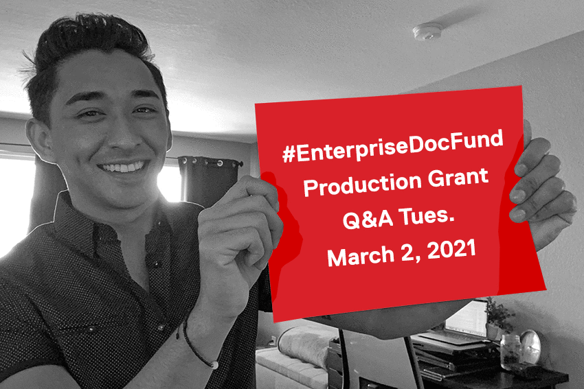 Grants Coordinator Kenny Brown, man in 20s with mixed Asian and European ancestry, holding up paper with text: "#EnterpriseDocFund Q&A Tues. March 2, 2021"