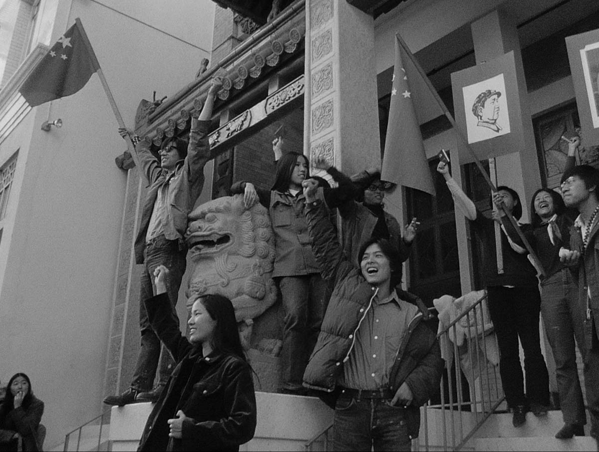A group of Asian Americans staging a protest on the steps of a city building.  From ‘Chinatown Rising.’ Courtesy of ‘America Reframed’/World Channel