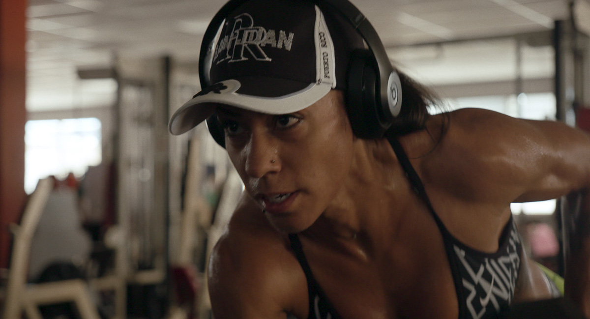 Jeannette Feliciano is a queer Puerto Rican competitive bodybuilder, seen here in action at the gym. From Maris Curran’s ‘Jeannette,’ which won the Audience Award for Best Documentary Feature, Courtesy of the film team.