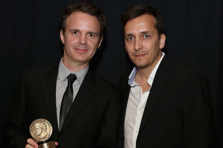The late Brent Renaud (right) with his brother Craig, with the Peabody Award that they won in 2015 for their series “Last Chance High.” Photo: Cindy Ord. Courtesy of Jeffrey Jones/Peabody Awards.