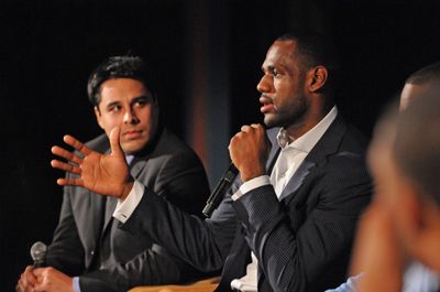 Basketball star LeBron James (right) and filmmaker Kristopher Belman discuss Belman's film More Than a Game. 