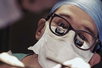 Close up of a surgeon focusing 