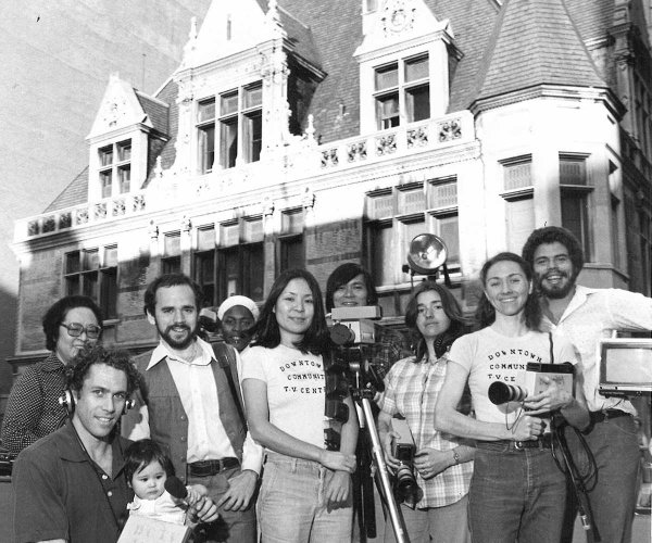 A group of people stand in front of DCTV’s new firehouse location in 1972. Courtesy of DCTV