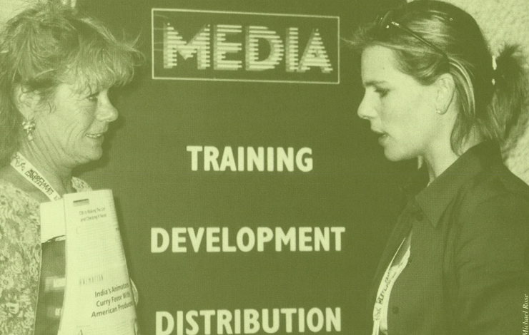 Suzanne Meltzer, public affairs coordinator for The Marketplace (left) confers with Helen Danielson, producer.