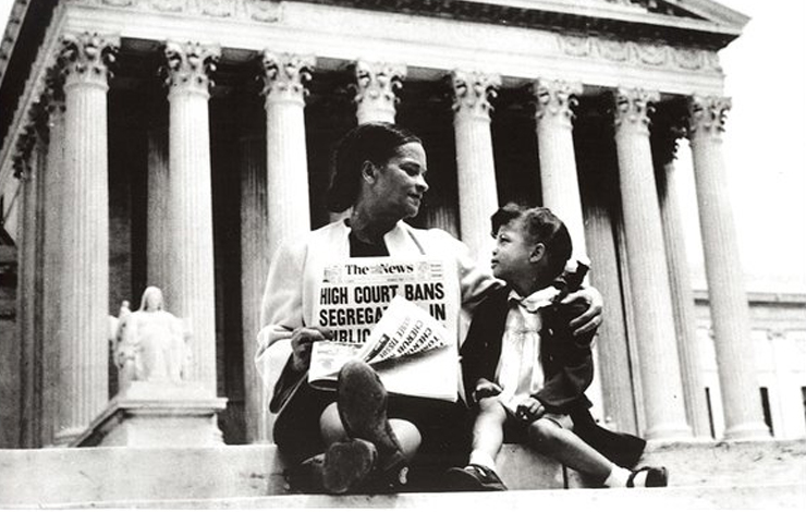 Mrs. Nettie Hunt sits on the steps of the Supreme Court with her daughter after the historic 1954 <em>Brown v. Board of Education</em> desegregation ruling. From <em>The Rise and Fall of Jim Crow</em>.