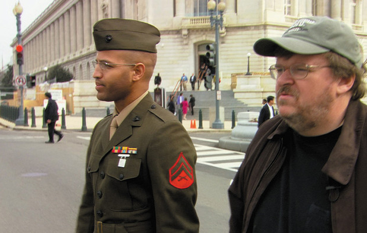 Michael Moore and Sgt. Abdul Henderson on Capitol Hill attempting to convince congressmen to send their sons to Iraq. From Michael Moore's <em> Fahrenheit 9/11</em>. Photo: Dog Eat Dog Films