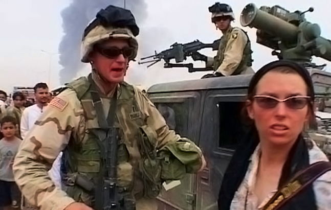 Stephanie Sinclair (right), a photojournalist for the Chicago Tribune. Photo from 'War Feels Like War', which appeared on PBS's P.O.V. in Julu. Photo: Uyarra Films.