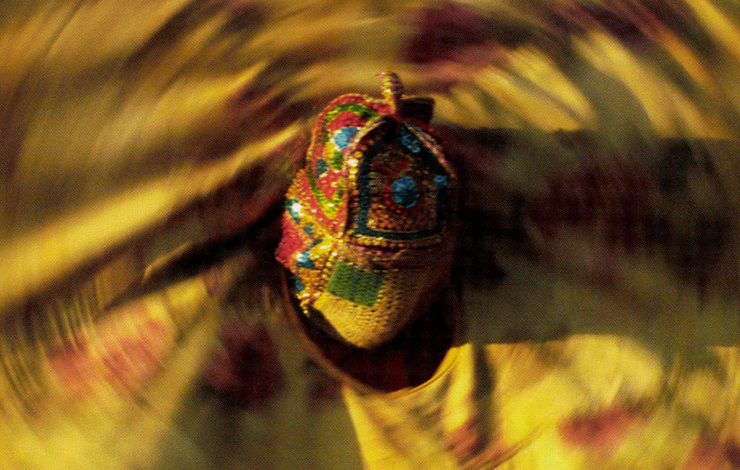In Ouidah, Benin, voodoo believers assert that touching the spinning cloth cape of a Revenant ancestor spirit during an E'gun-Gun ceremony can cause death. From Peter Friedman and Roger Manley's <em>Mana--Beyond Belief</em>, a nominee for the Documentary Feature Award at the 2004 IFP Market. Photo: Jacques Besse