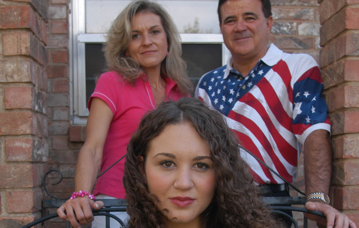 Shelby Knox with her parents, Paula and Danny Knox, outside their home in Lubbock, Texas. From 'The Education of Shelby Knox,' which airs in June on PBS' P.O.V.