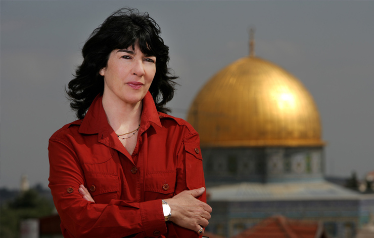 Christiane Amanpour stands in front of the Dome in the Rock in Jerusalem, Israel in February 2007. Photo: Brent Stirton/Getty Images for CNN