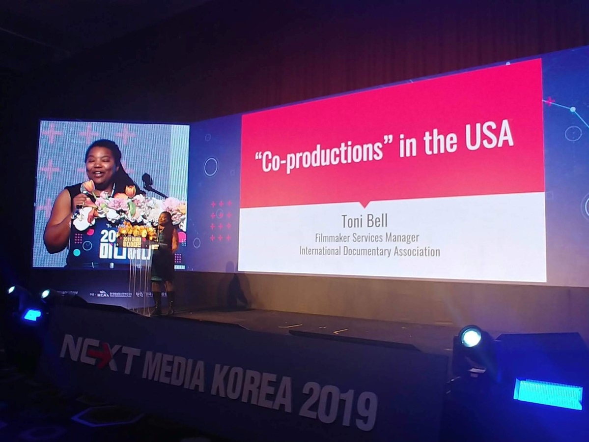 Toni Bell delivering a presentation at Korea Next Media Group.