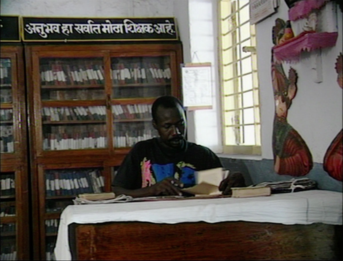 Harrison Cudjoe is a Nigerian poet seen sitting in the library of Yerawada Central Prison. Photo by KP Jayasankar