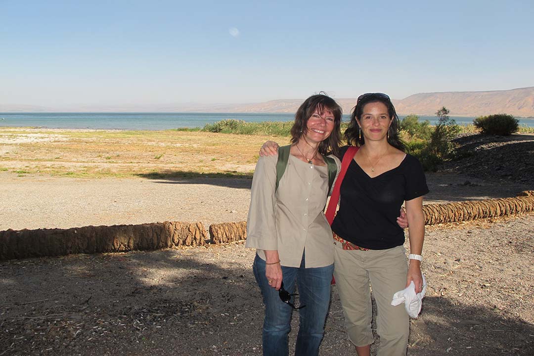 Diane Weyermann in a cream shirt and denims standing with Elise Pearlstein in a black shirt, in Israel. Courtesy of Elise Pearlstein.
