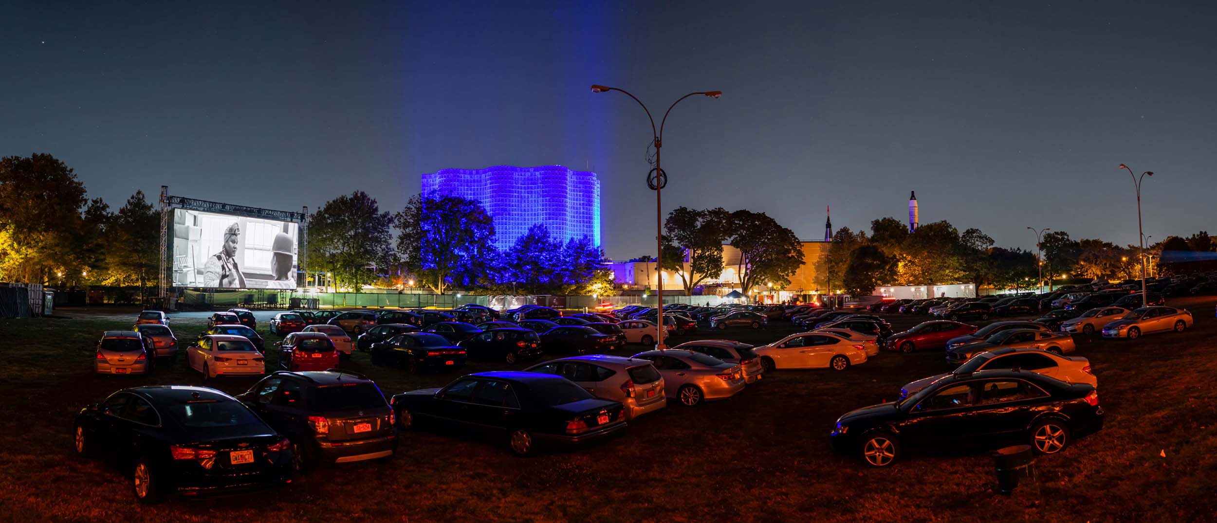 A drive-in screening at New York Hall of Science’s parking lot, which was converted to a screening venue by Rooftop Films. Photo by Maike Schulz. Courtesy of Rooftop Films.
