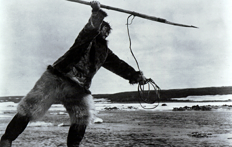 A person wields a spear, from Robert J. Flaherty's 'Nanook of the North'