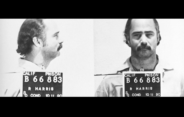 A black-and-white mugshot from 'Procedure 769.'