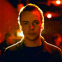 A white man with short blondish hair.  