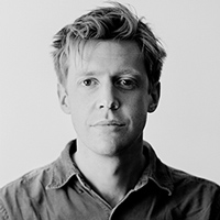 James Spinney is a white adult wearing a shirt