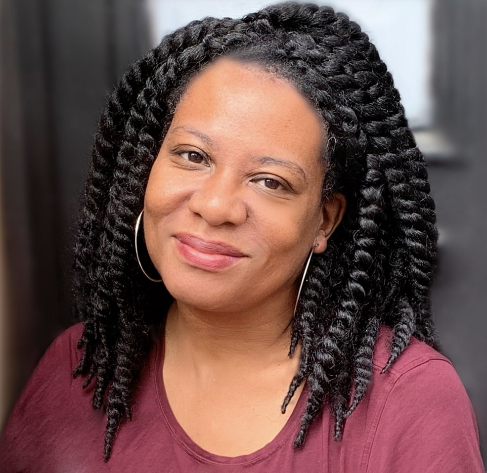  Erika Dilday, the executive producer of ‘POV,’ is an African American woman with dreads, hoop earrings, and a mauve top.. Photo courtesy of ‘POV’.