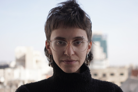 Photo of a white woman with short hair.