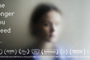 A photo portrait of the film's protagonist - a young Ukrainian woman with short, chin length hair - but the image is heavily pixelated/distorted.