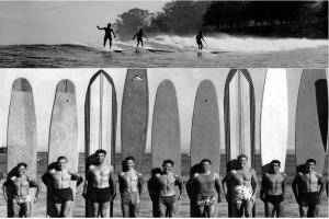 Black and white photo of a group of surfers lining up and holding surfboards