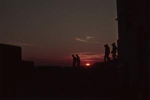 Silhouettes of six men against a setting sun. Image from Vittorio de Seta's 'Solfatara.' Courtesy of The Criterion Collection