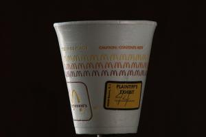 McDonald's branded paper coffee cup.