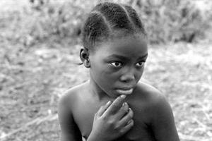 A black-and-white photo of a child from 'Wend Kuuni (God's Gift).'