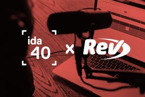 A mounted microphone next to a laptop with a red overlay and the IDA and Rev logos centered in white. 