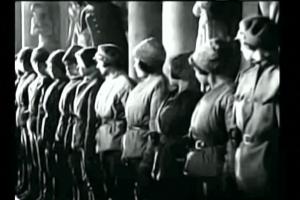 A line of people dressed similarly from Sergei Eisenstein's 'October: Ten Days That Shook the World.'