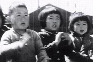 A black-and-white photo of Asian-American toddlers from 'Something Strong Within', a film directed and edited by Robert A. Nakamura, produced and written by Karen L. Ishizuka.