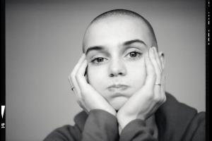 Sinéad O’Connor in a black and white photo.
