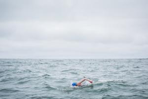 Kim swims near the San Francisco coast.