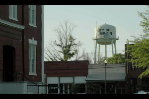 The city of Lumpkin Water Tower looms over the empty Old Town streets