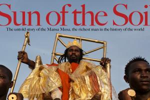 two African men carry Mansa Musa on a golden throne.