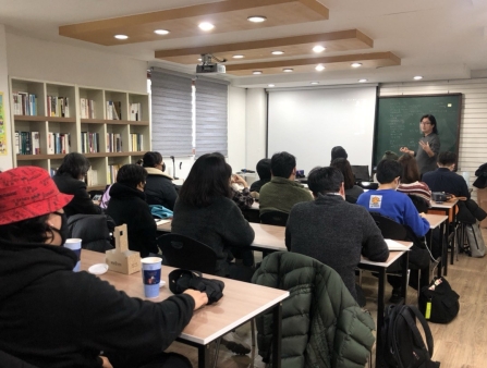 A classroom of students.