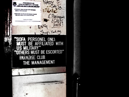 A protest slogan on a wall.