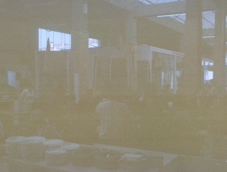 Faded photograph of a room of seminarians.