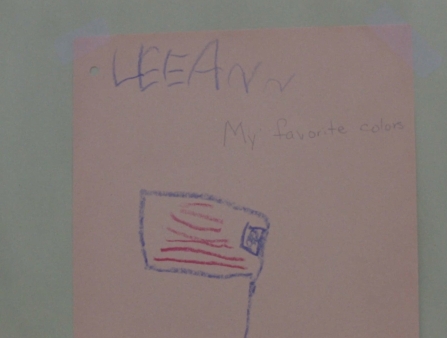 Post-it note with a drawn American flag and the words "LeeAnn"