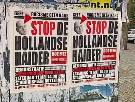Political posters in Dutch plastered on a street wall