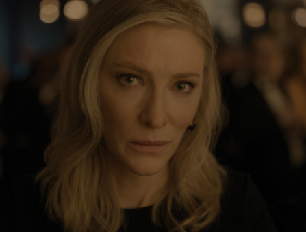 Close up shot of a blonde woman looking into the camera 